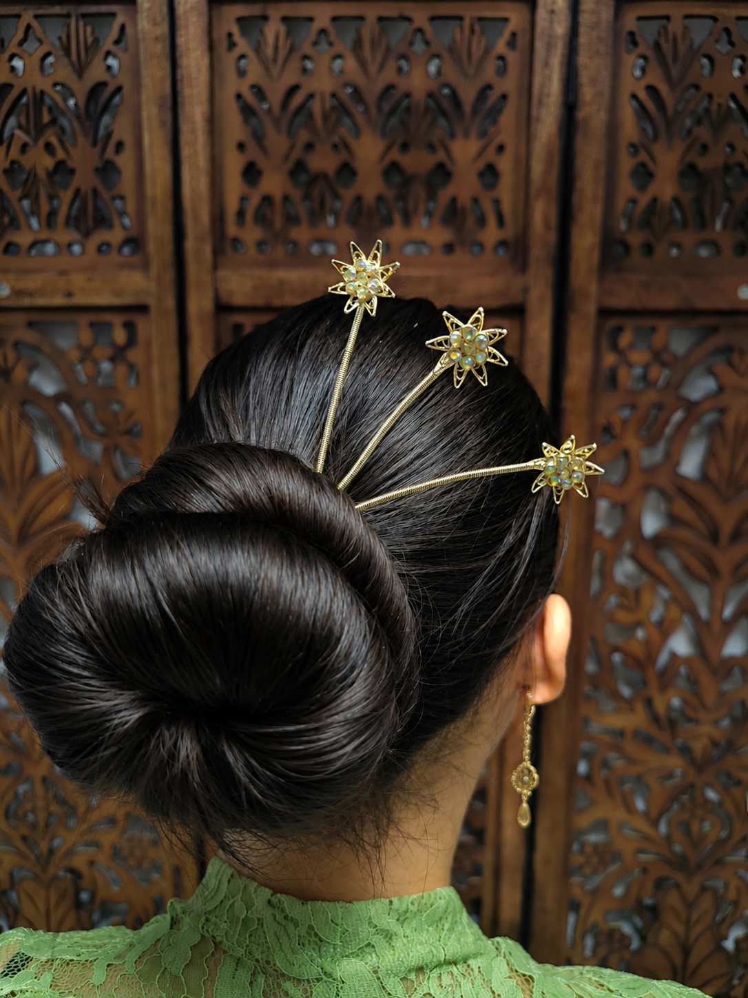 Haarsteker met drie bloemetjes