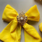 Slendang geel, zonder broche