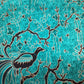 Traditionele sarong Prada ranting, turquoise en zwart met goud en vogels